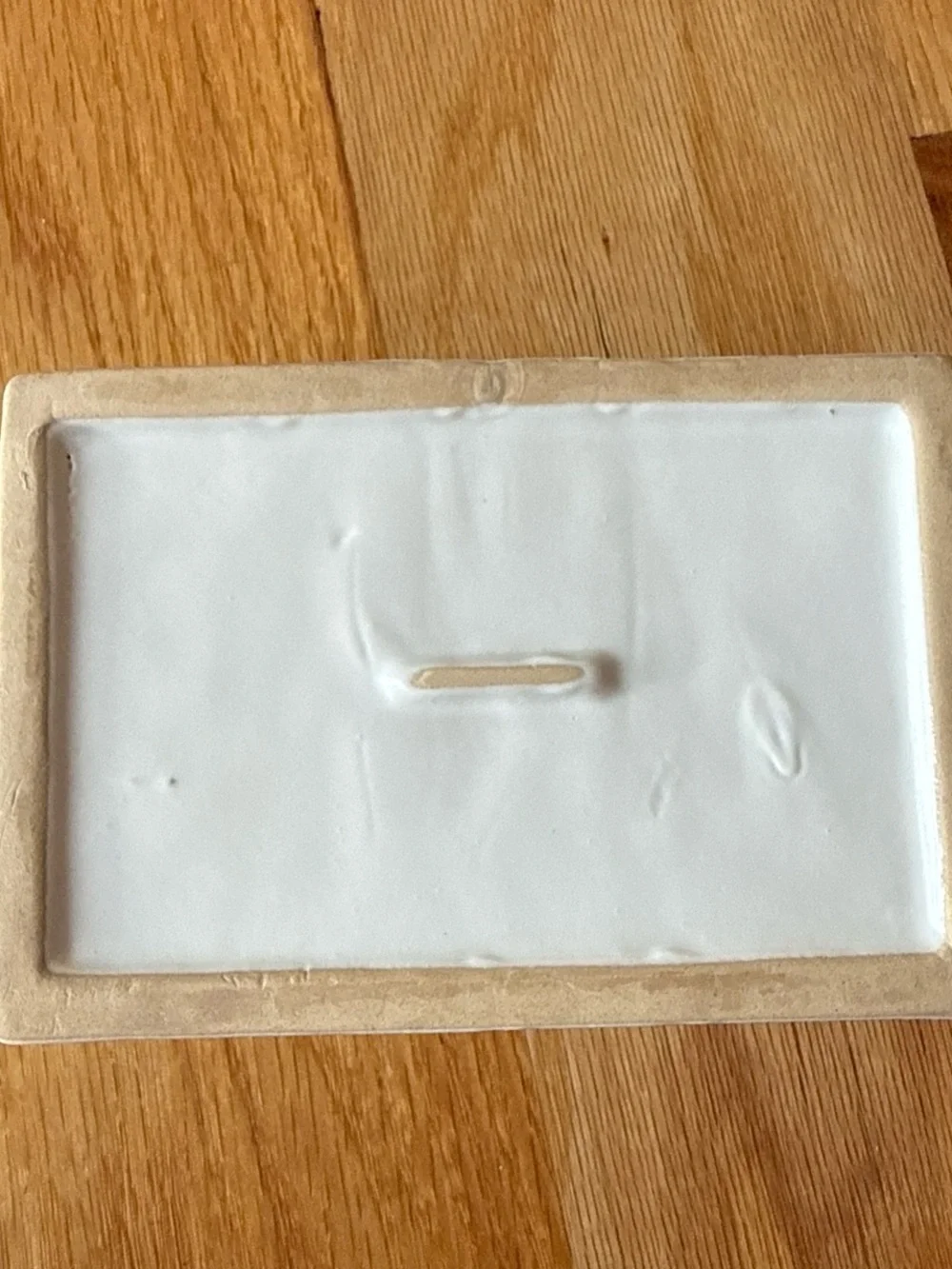 White ceramic pottery barn soap dish